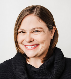 Margaret Armour headshot with a black sweater